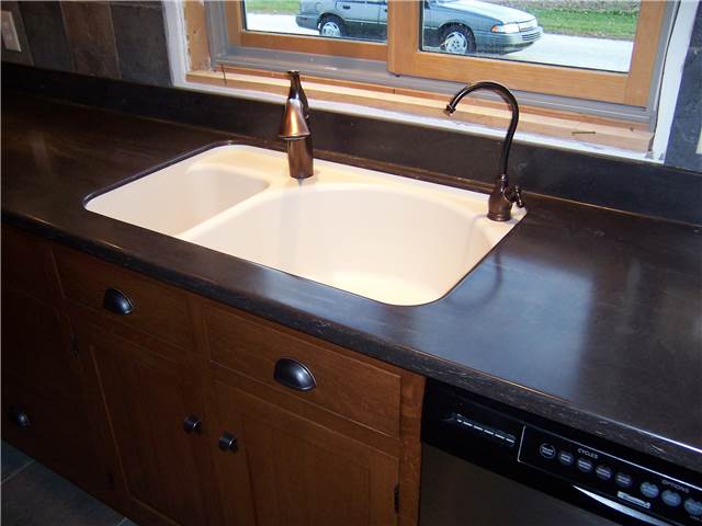 Corian solid surface countertop with a Corian undermount sink